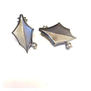 Clip earrings.  Leaf shape with pearl accent